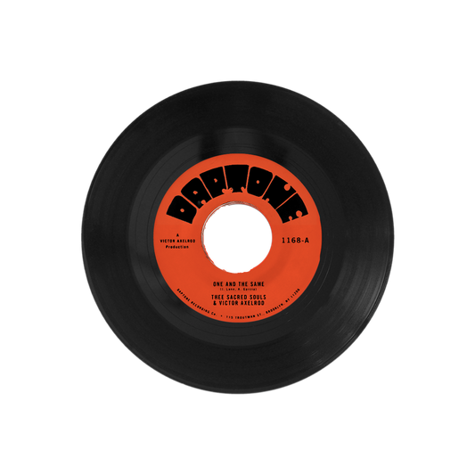 Black vinyl record with a red label on a white background