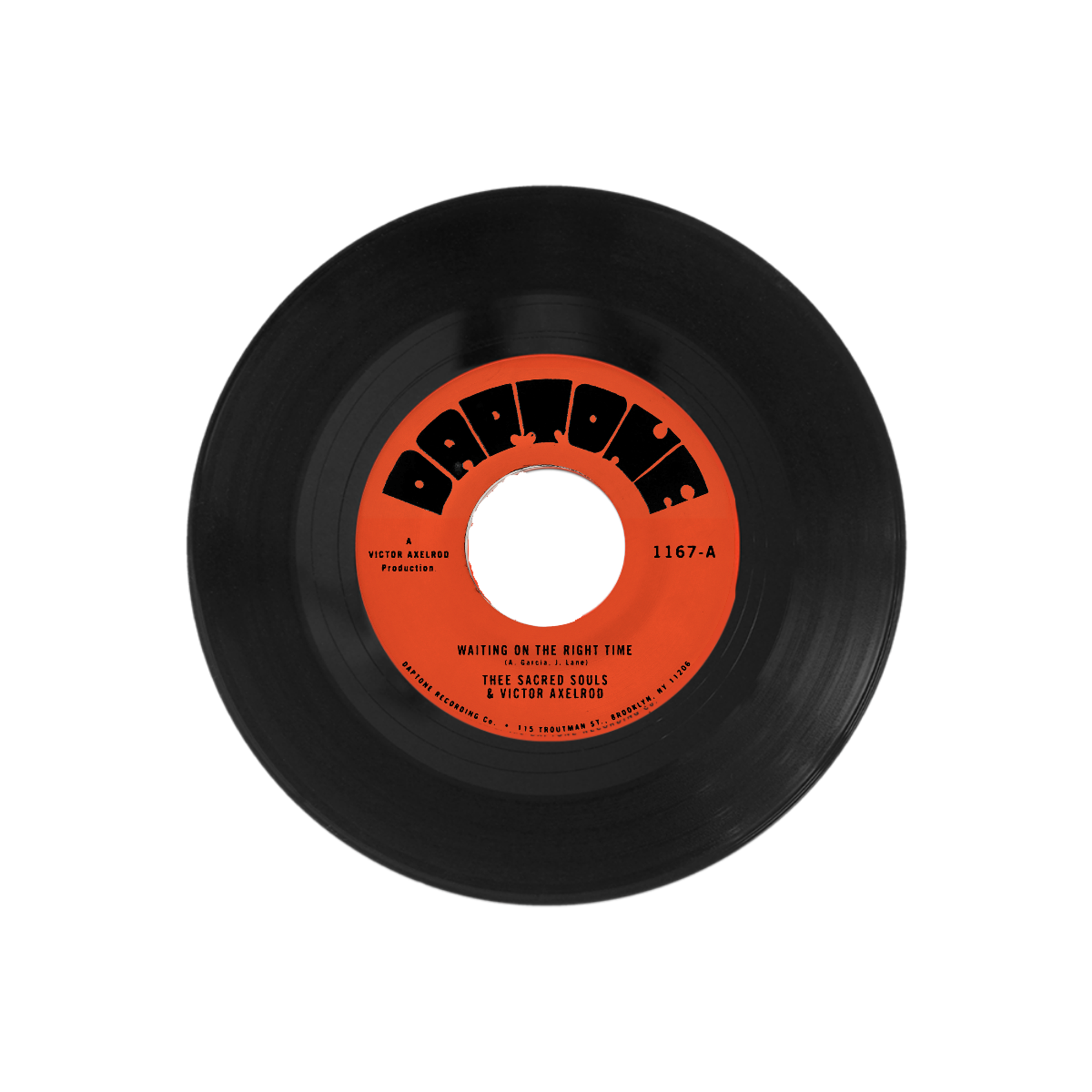 Black vinyl record with a red label on a white background
